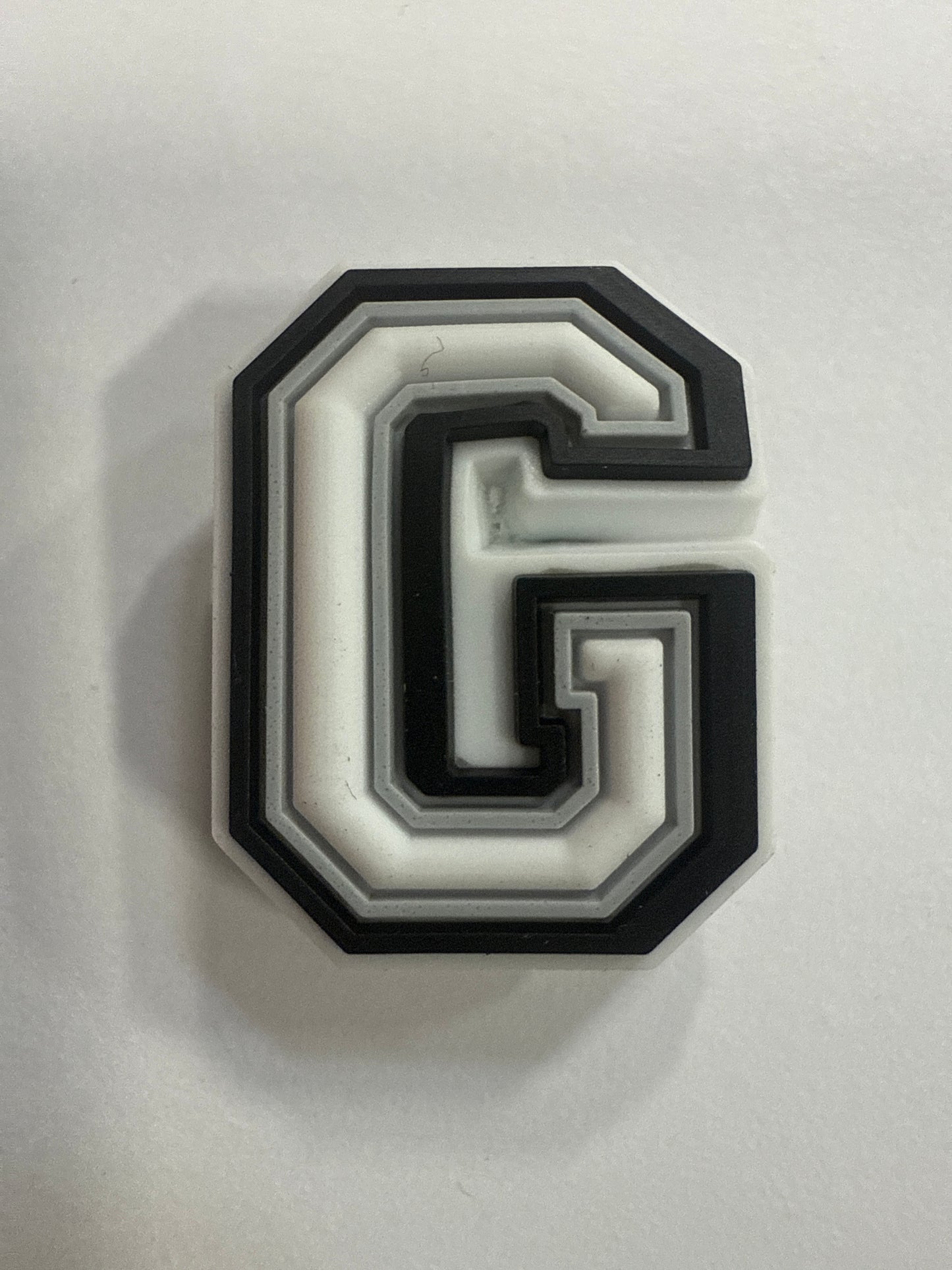 White Letter G