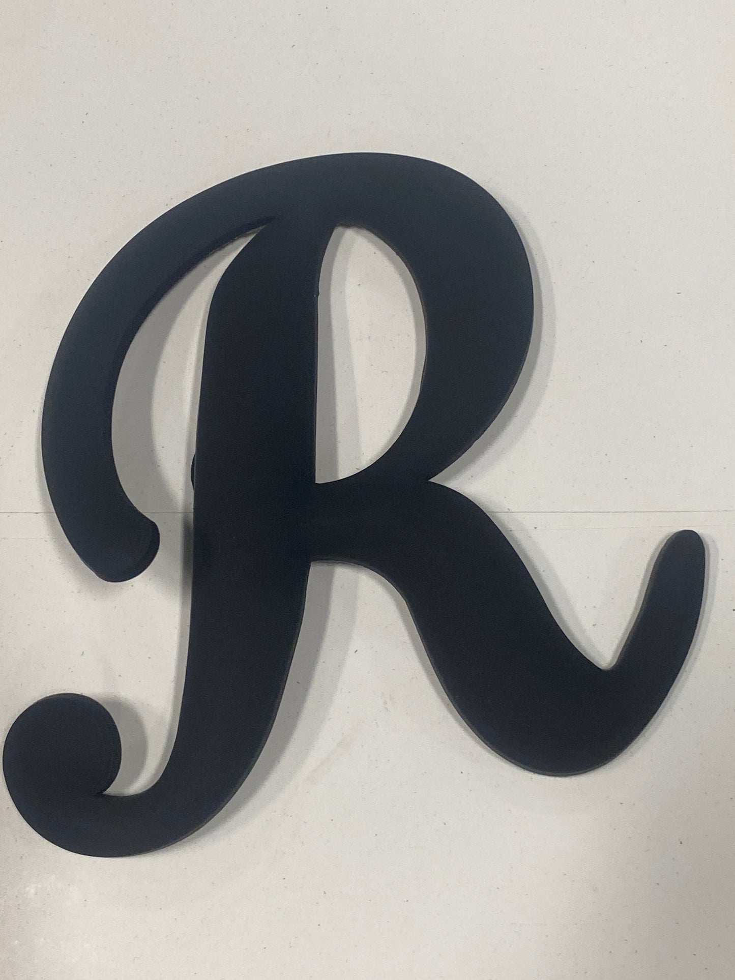 Black Big Letter R
