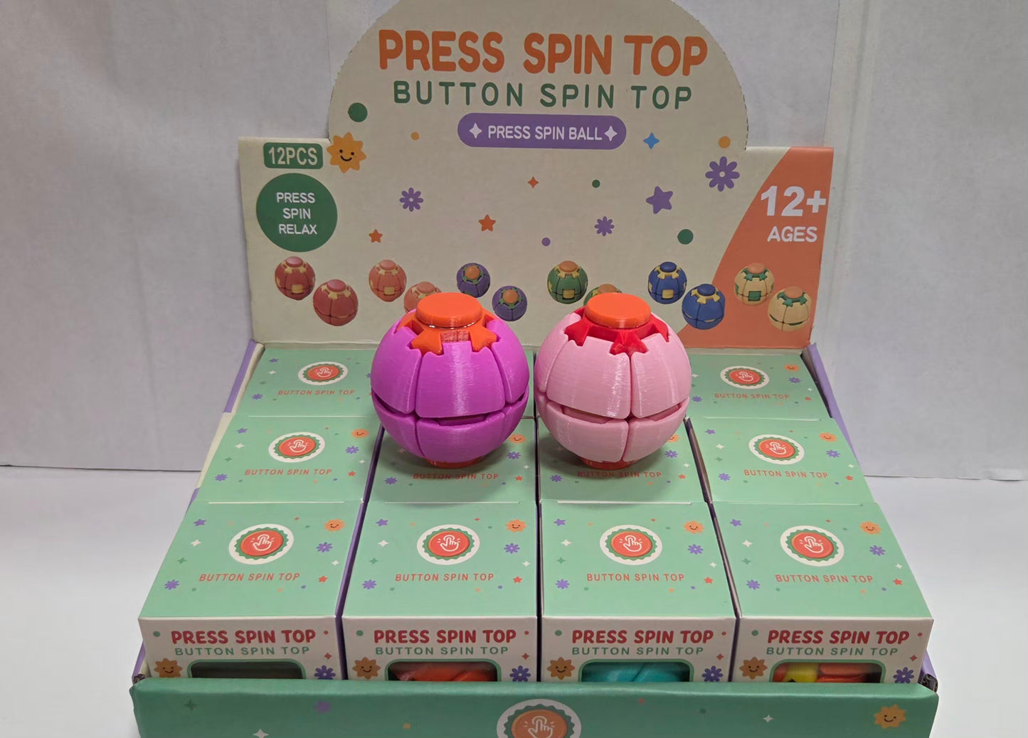 Press Spin Top