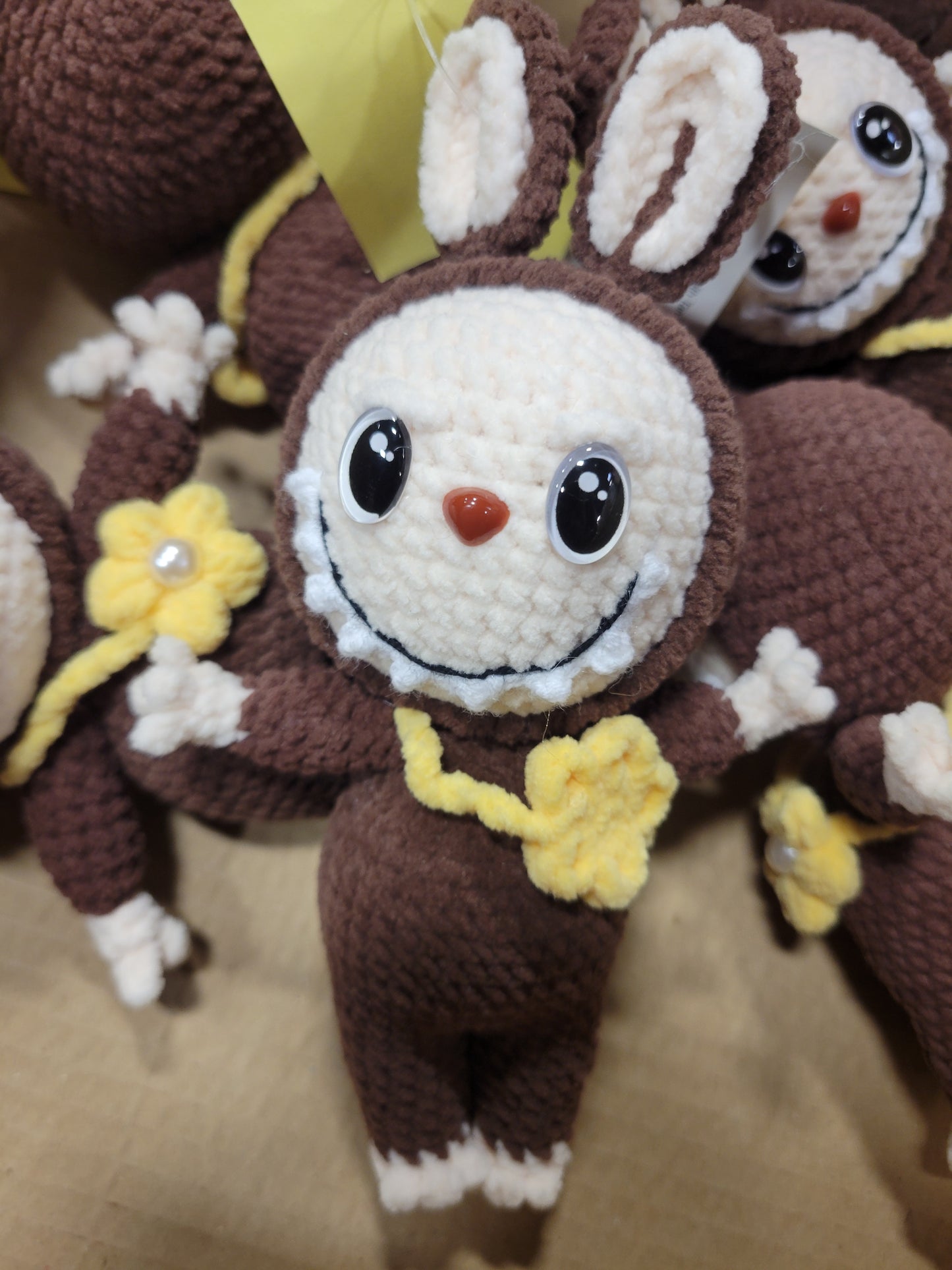 Dark Brown Labubu Doll with Tan Flower