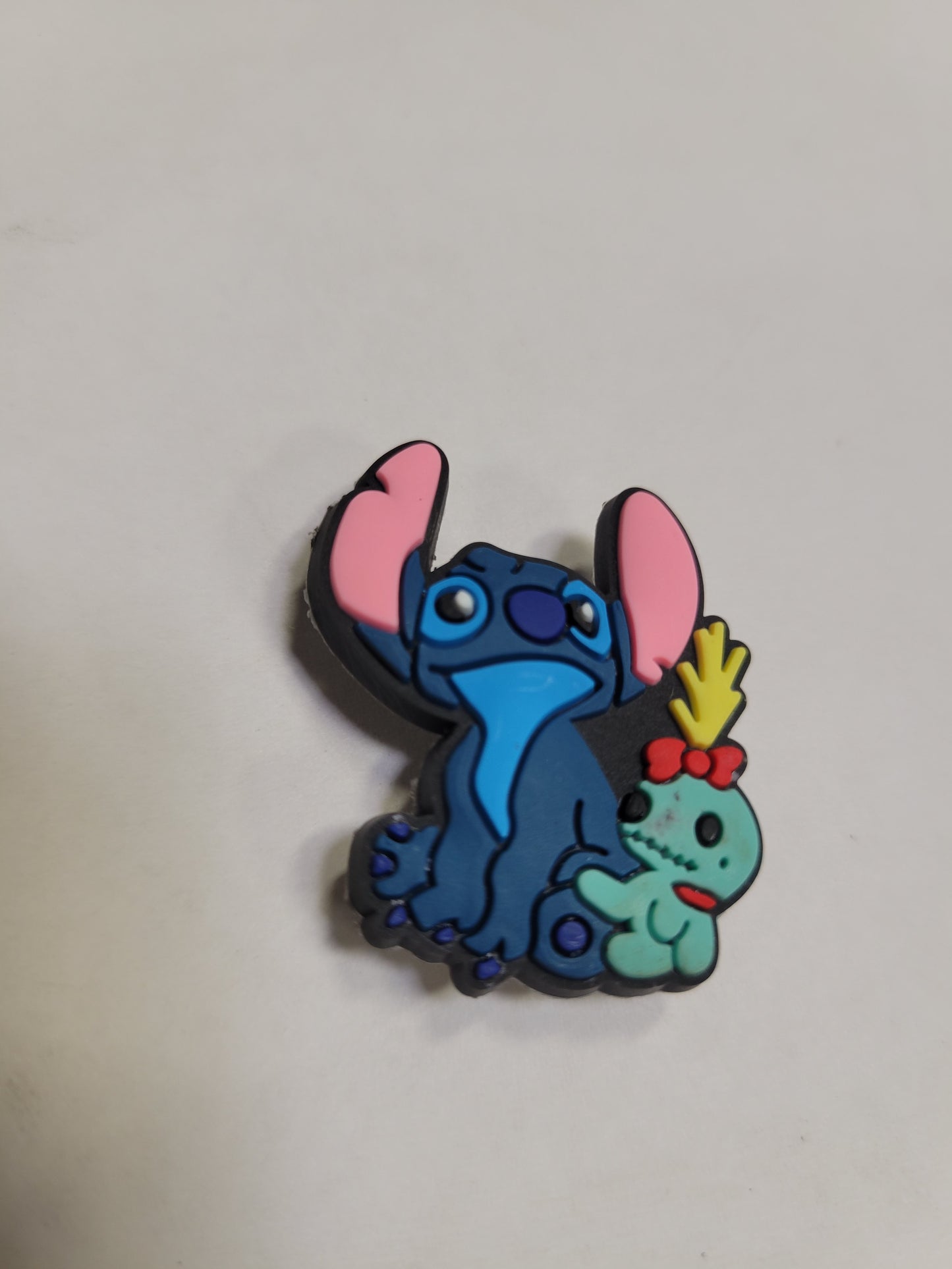 Stitch with a Doll Charm (Lilo and Stitch)