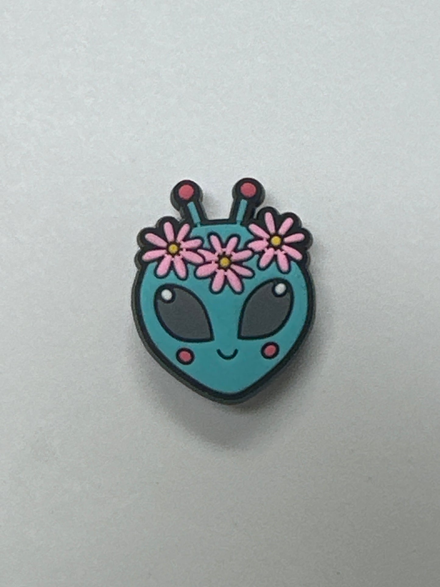 Alien with flowers