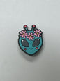 Alien with flowers