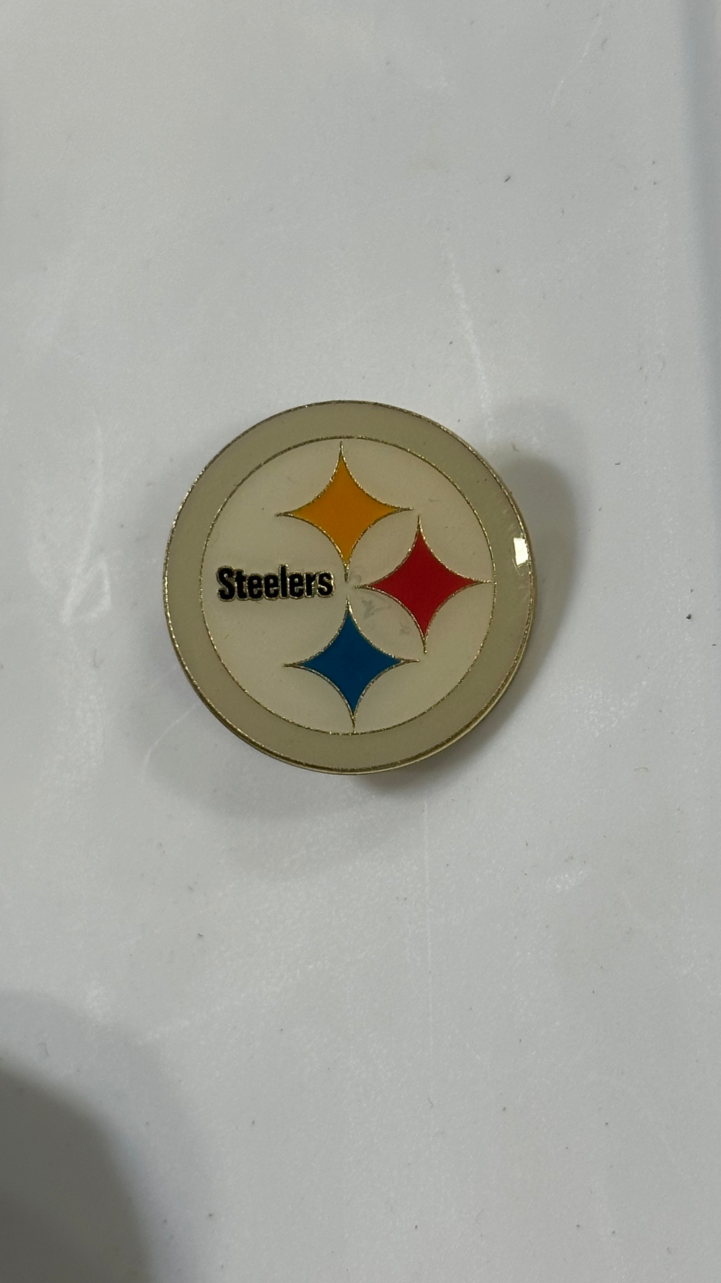 Metal Pin - Circle with Yellow, Red, Blue Stars