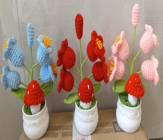 Crochet flower pot with strawberry