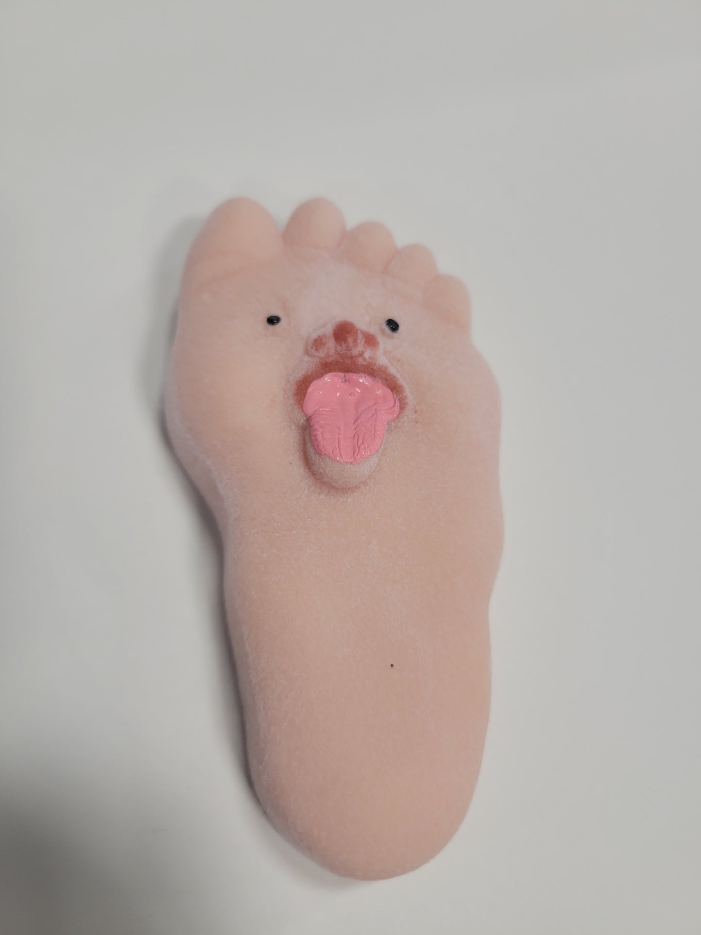 Foot squeeze toy