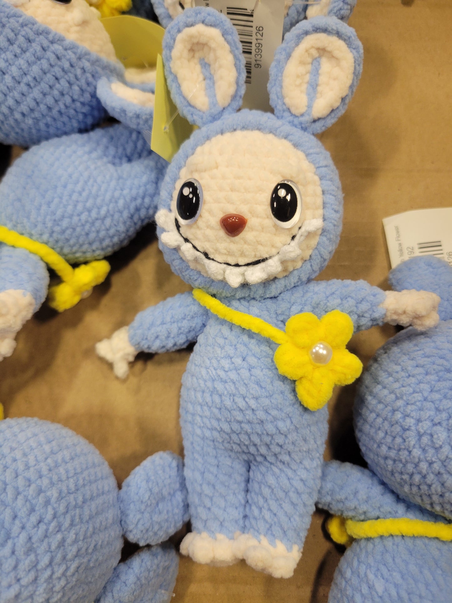 Light Blue Labubu Doll with Yellow Flower