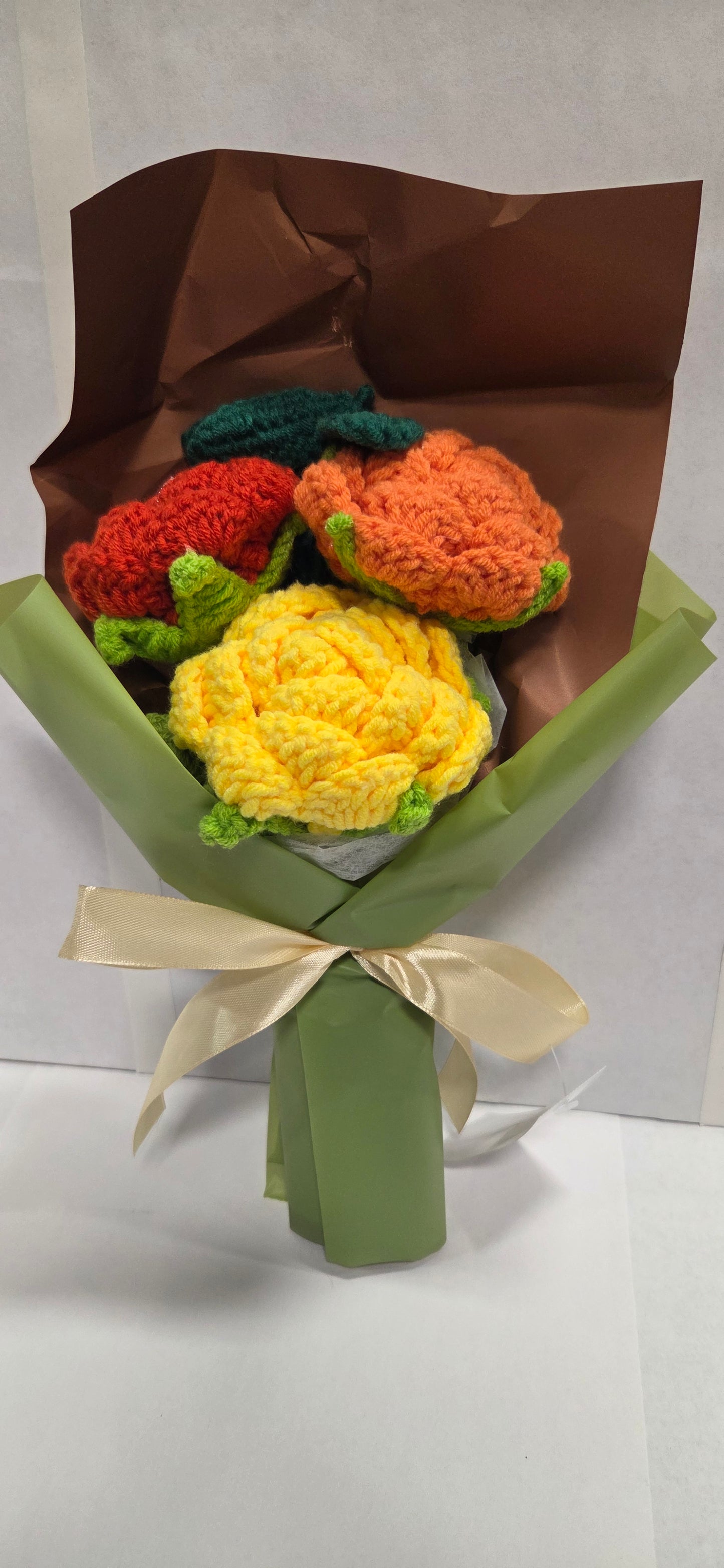 Crochet Bouquet orange red and yellow roses & forest green wrap