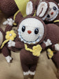 Dark Brown Labubu Doll with Tan Flower