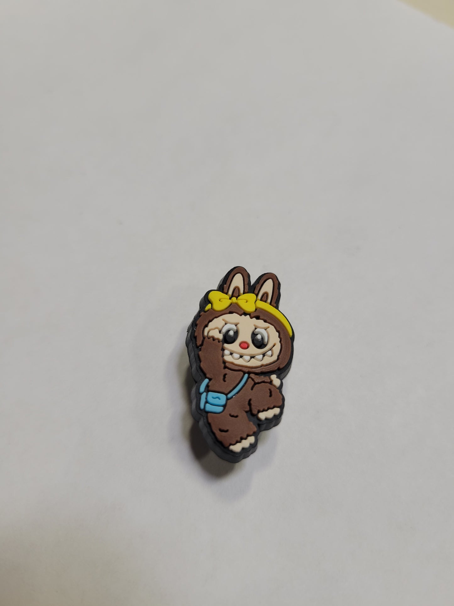 Brown Labubu Girl with Yellow Tie and Blue Bag Charm