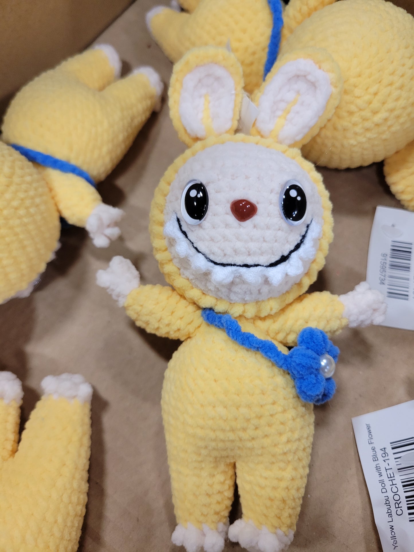 Yellow Labubu Doll with Blue Flower